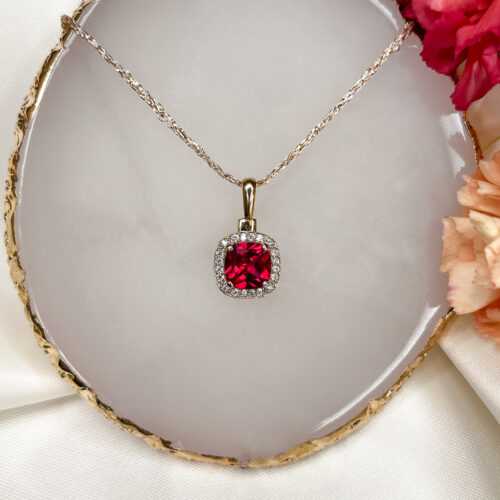 Złota zawieszka z cyrkoniami